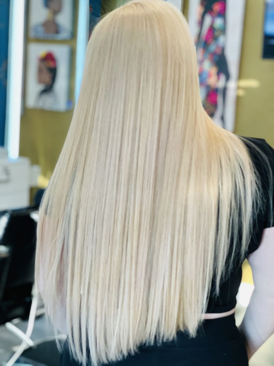 Glass-smooth sleek platinum blonde hair